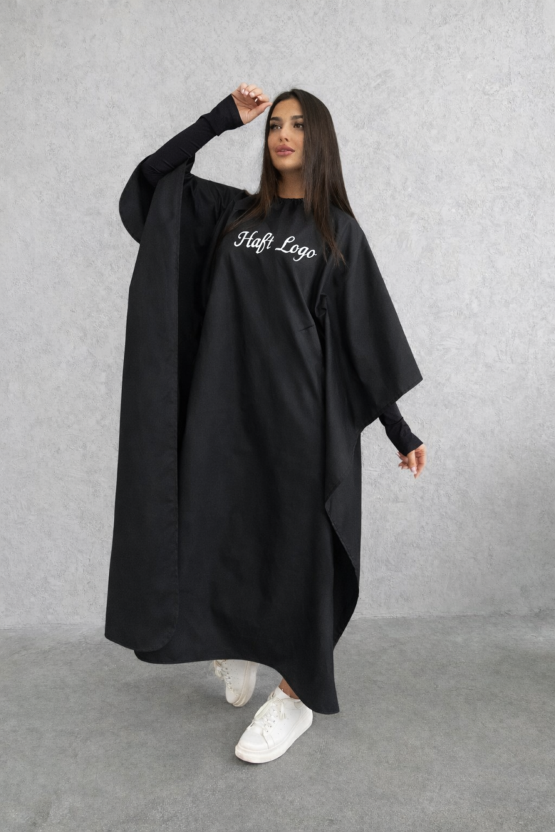 Haft na pelerynie fryzjerskiej